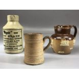 Collection of three miniature jugs: one Doulton, one for the 'Magic Polish Co.' and one further, the