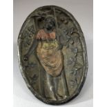 Heavy metal / iron oval dish with the figure of a woman picking apples from a ladder; figure