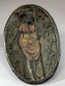 Heavy metal / iron oval dish with the figure of a woman picking apples from a ladder; figure