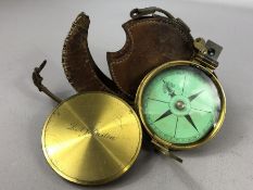 Brass compass in leather case, approx 7cm in diameter