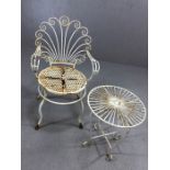 White metal small ornate circular garden table, approx 44cm in diameter and single chair