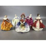 Collection of six ceramic figurines, two with seated couples, some with makers marks to base,