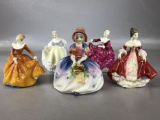 Collection of six ceramic figurines, two with seated couples, some with makers marks to base,