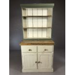 Small painted pine kitchen dresser with three shelves over, two drawers and cupboard under, approx