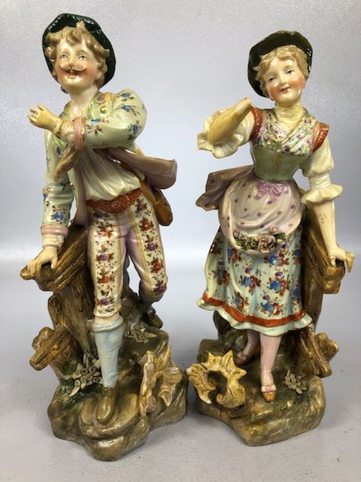 Collection of ceramic figurines to include a lady holding a dog signed B. Merli, a Staffordshire - Image 6 of 7