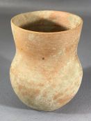 Small Roman terracotta cup or pot with slightly tapering neck and raised on a very slight foot,