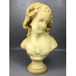 Resin bust of a young girl on circular plinth, approx 45cm tall