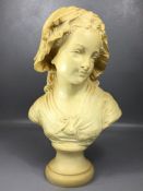 Resin bust of a young girl on circular plinth, approx 45cm tall