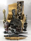 Good collection of carved wooden items to include African figures, tribal items, letter openers, a