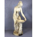 Large carved marble/ Alabaster figure a semi-nude female standing on a circular plinth with a richly