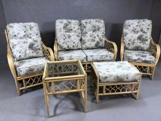 Rattan conservatory suite comprising two seater sofa, two armchairs, foot stool and coffee table