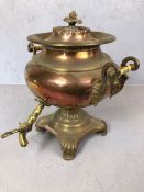 Antique brass and copper samovar with carved bone handles