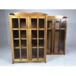 Pair of glass-fronted bookshelves / cabinets, each approx 81cm x 26cm x 118cm tall