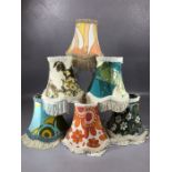 Six retro lamp shades in varying vintage fabrics, each approx 14cm in diameter