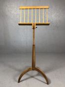 Adjustable wooden music stand on curved legs