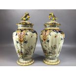 Pair of French Rouen pottery vases, each lid topped with a bird, approx 29cm in height, marked Rouen