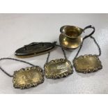 Collection of Silver hallmarked items to include small jug, nail polisher and three decanter