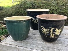 Three modern painted pots, two with a bamboo theme