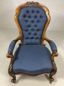 Victorian bedroom or nursing chair on carved oak frame in blue button back upholstery and on