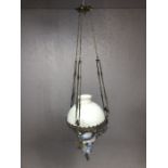 French 'rise and fall' hanging oil lamp with glass shade and chimney, ceramic base with floral