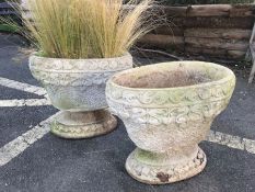 Pair of oval planters on bases, approx 45cm wide