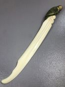 Carved Bone letter opener with decorative Parrot with glass eyes and applied silver initials