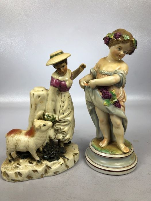 Collection of ceramic figurines to include a lady holding a dog signed B. Merli, a Staffordshire - Image 5 of 7