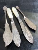 Four Silver Sheffield hallmarked Silver Knives two with pearl handles (total weight 94g)