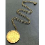 Gold Half Sovereign dated 1912 in full gold mount on a fine 9ct gold chain (total weight approx 10.