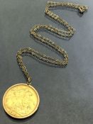 Gold Half Sovereign dated 1912 in full gold mount on a fine 9ct gold chain (total weight approx 10.