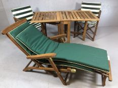 Collection of Teak garden furniture to include steamer chair, two folding chairs and table