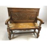 Heavily carved oak bench, approx 98cm x 46cm x 110cm