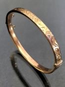 9ct Gold Oval Christening Bangle with inscribed detaining to one half, good hinge and clasp (