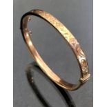 9ct Gold Oval Christening Bangle with inscribed detaining to one half, good hinge and clasp (