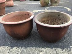 Pair of circular painted pots, approx 38cm in diameter
