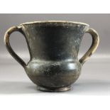Twin handled Greek terracotta Kantharos with remnants of black glaze, approx 7.5cm in height