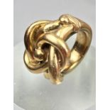 Chunky twisted Gold ring (a ring inside a ring) unmarked but tests as 9ct or above size 'K' and 32.