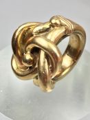 Chunky twisted Gold ring (a ring inside a ring) unmarked but tests as 9ct or above size 'K' and 32.