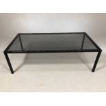 Mid Century metal framed coffee table with black smokey glass, approx 122cm x 61cm x 39cm tall