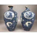 Pair of Royal Bonn Flamane vases of ovoid form with flared necks and panels depicting countryside