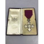 Order of the British Empire Members breast badge (MBE), hallmarked Silver London, Garrard & Co,
