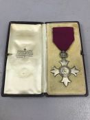 Order of the British Empire Members breast badge (MBE), hallmarked Silver London, Garrard & Co,