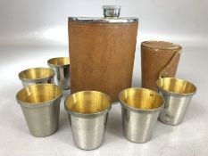 Set of six stirrup cups by maker CROSS in leather pouch and a leather wrapped Hip Flask