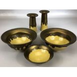 Lustre slipware ceramic set in mustard and copper drip glaze to include two bowls, approx 15.5cm
