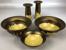 Lustre slipware ceramic set in mustard and copper drip glaze to include two bowls, approx 15.5cm