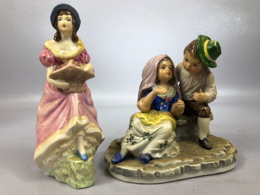 Collection of ceramic figurines to include a lady holding a dog signed B. Merli, a Staffordshire - Image 7 of 7