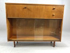 Mid Century sideboard with fall front cupboard, two drawers and glass sliding shelves