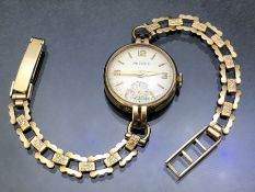 9ct Gold ladies wristwatch by PEEREX Swiss Made Antimagnetic on 9ct gold hallmarked strap (total