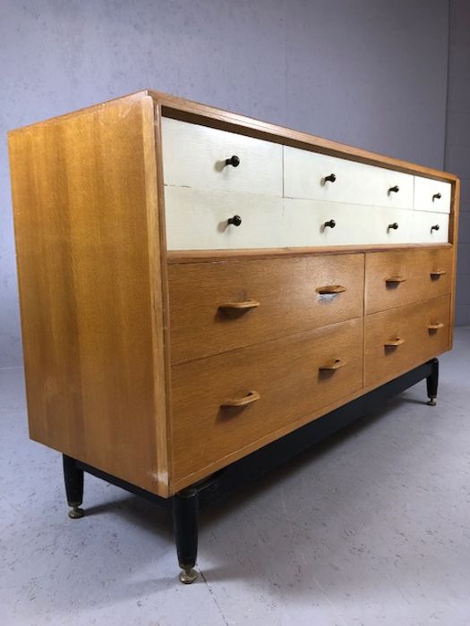 G-Plan Mid Century sideboard of ten drawers on black lacquered feet with brass detailing, six - Image 8 of 9