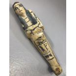 Wooden shabti with black painted detailing to face and body, approx 16.5 cm in length, losses can be